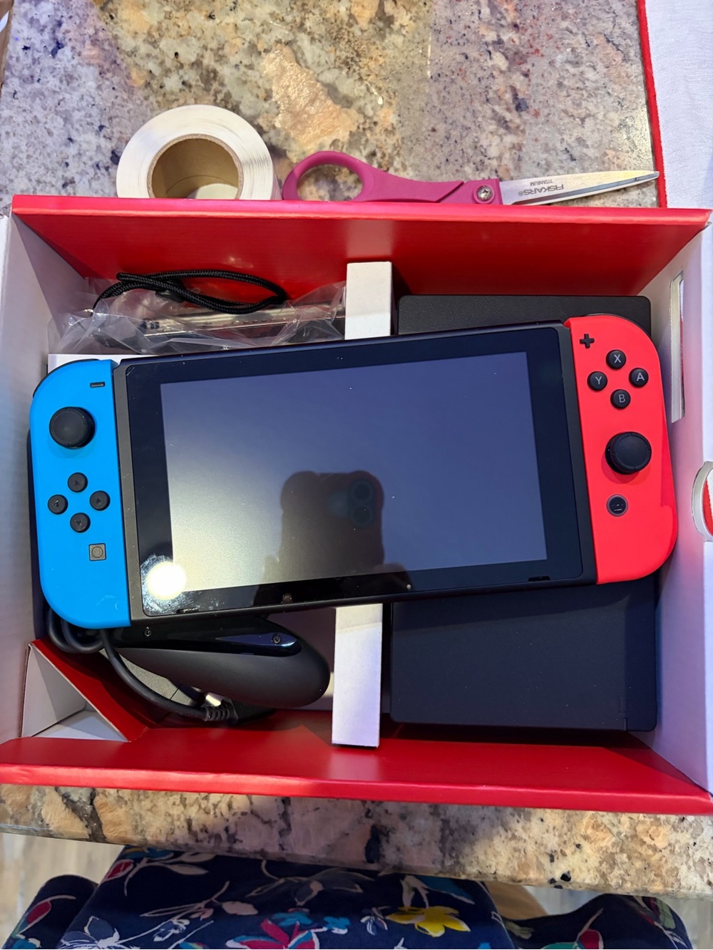 Nintendo Switch with Neon Blue Left and Neon Red Right Joy-Con